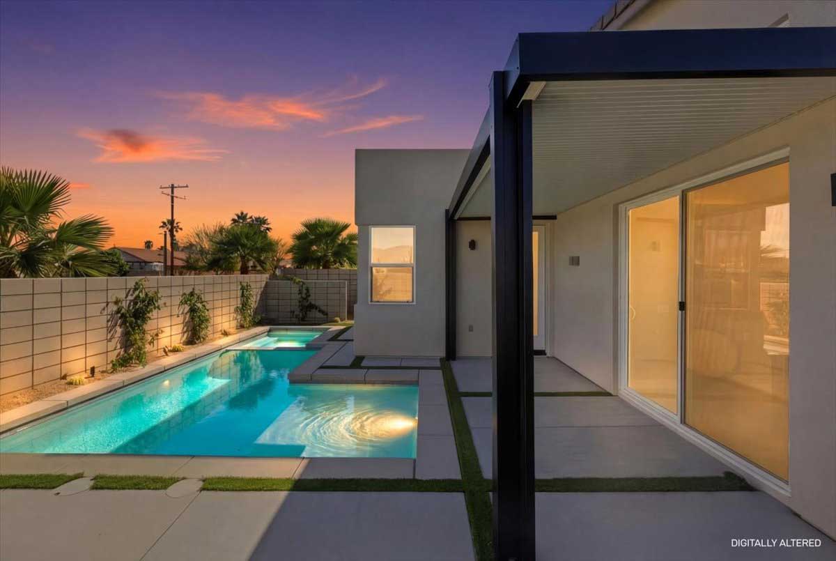 lot 1 rear pool and yard at twilight.