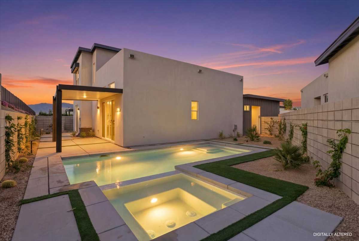 lot 12 back of home with pool at twilight.